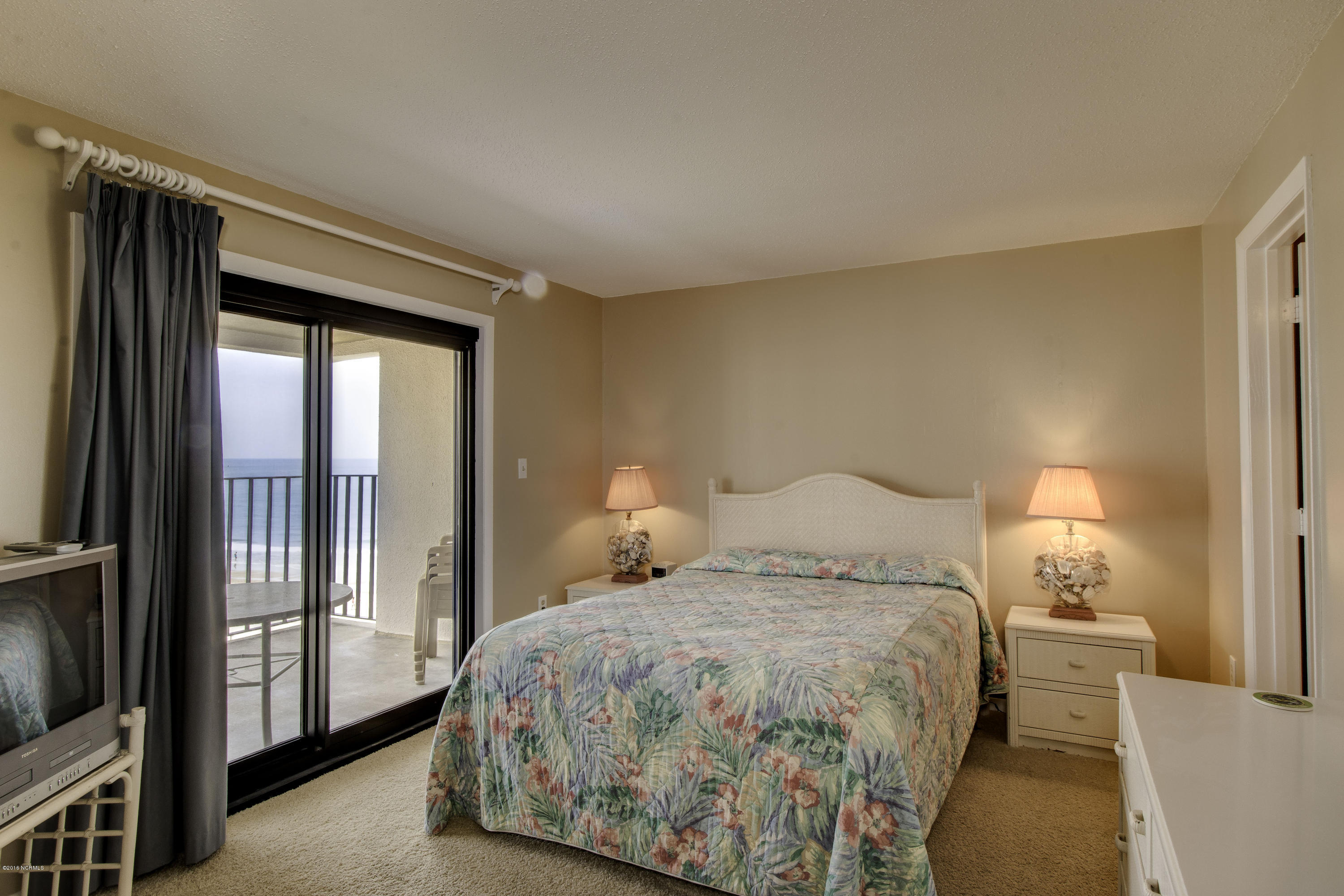 1505 Salter Path Road, Unit 533 Indian Beach, NC 28512 - Photo 9 of 10 Master will great ocean views, full bath and walk out to deck.