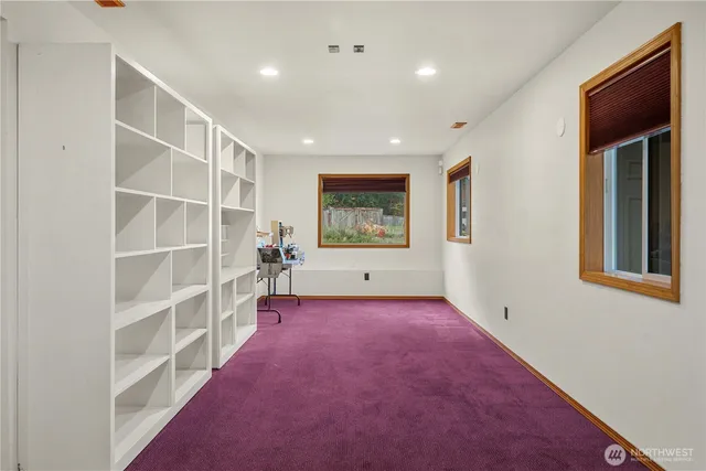 a kitchen with cabinets and a sink