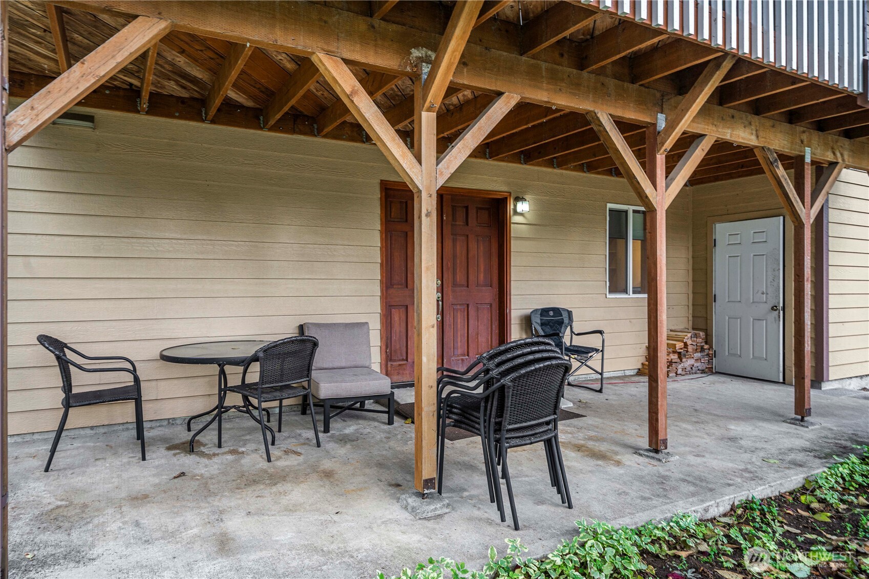 21103 16th Street East Lake Tapps, WA 98391 - Photo 23 of 30 a view of a chairs and table in the patio