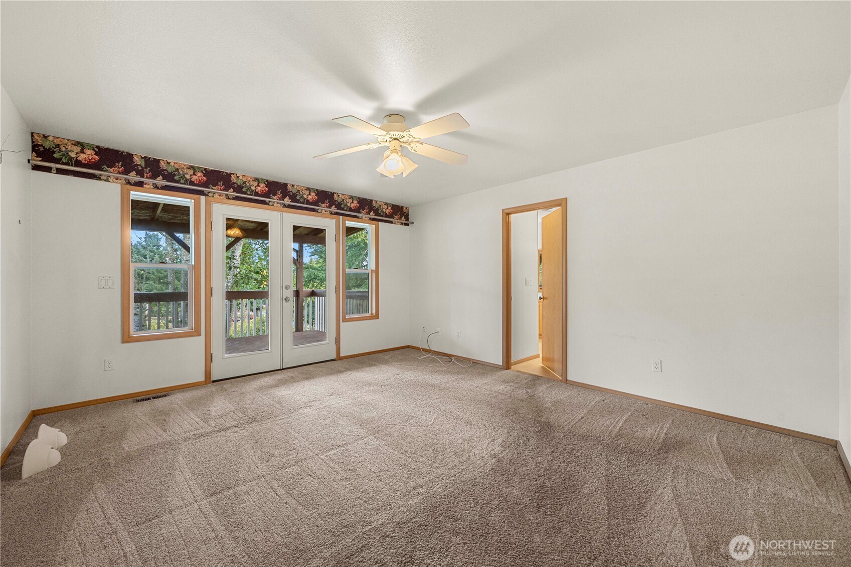 21103 16th Street East Lake Tapps, WA 98391 - Photo 7 of 30 a view of an empty room with a window