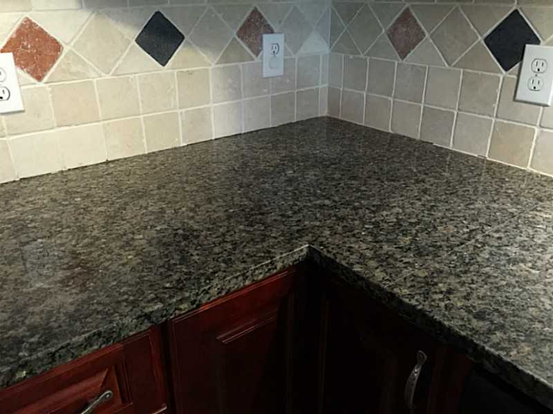 55 Dye Hill Road Hopkinton, RI 02832 - Photo 8 of 22 Kitchen. granite countertops in all baths, stone backsplash
