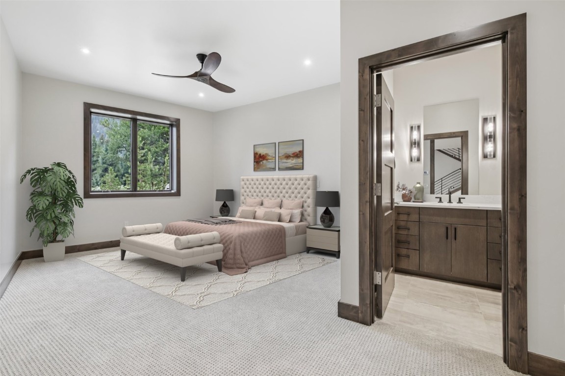 27 West Independence Road Keystone, CO 80435 - Photo 31 of 48 Bedroom featuring light colored carpet, recessed lighting, a ceiling fan, and ensuite bath
