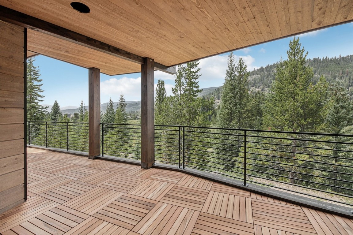 27 West Independence Road Keystone, CO 80435 - Photo 34 of 48 Unfurnished sunroom with a mountain view and a view of trees