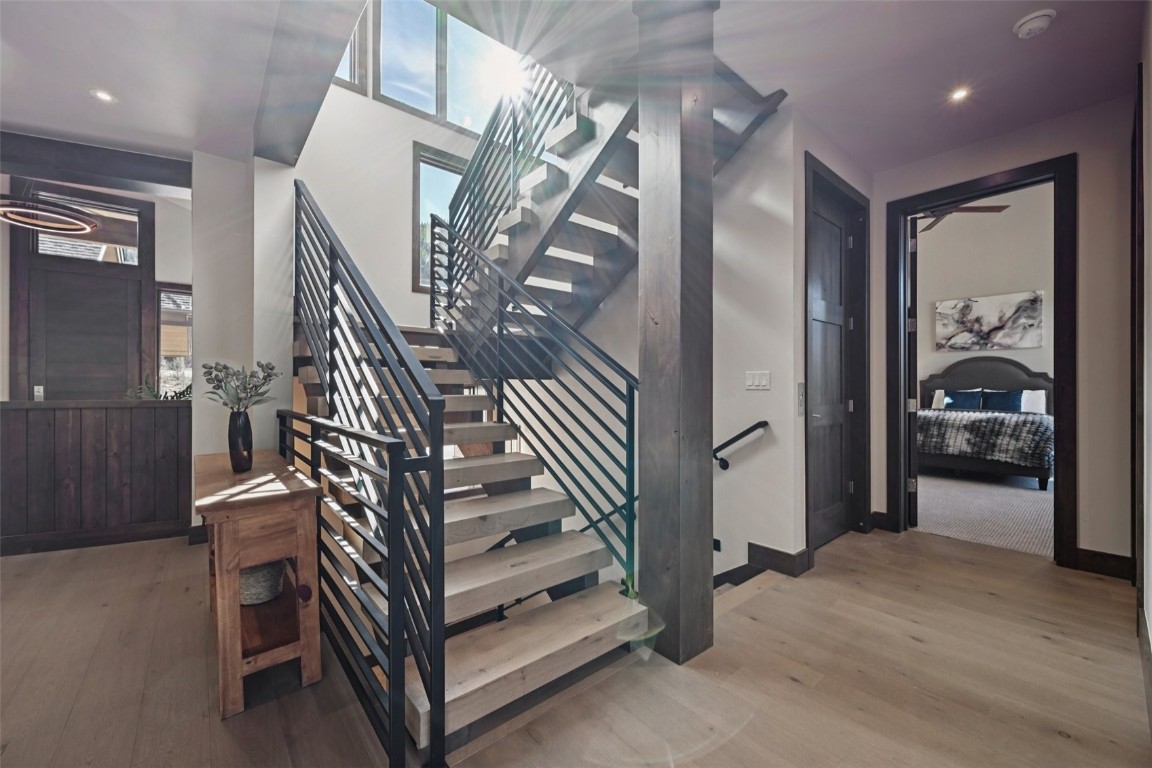 27 West Independence Road Keystone, CO 80435 - Photo 46 of 48 Staircase featuring recessed lighting and wood finished floors