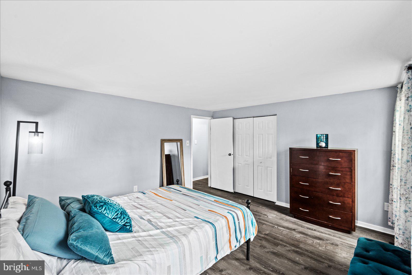 218 Victoria Drive Ruther Glen, VA 22546 - Photo 33 of 73 a bedroom with a bed and a couch