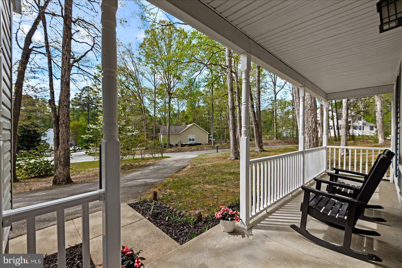 218 Victoria Drive Ruther Glen, VA 22546 - Photo 6 of 73 a view of a two chair in the balcony