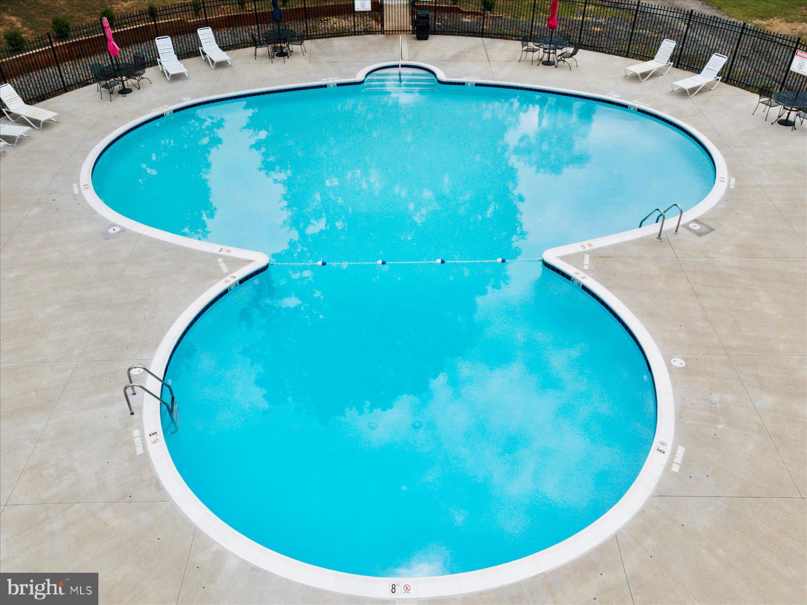 218 Victoria Drive Ruther Glen, VA 22546 - Photo 68 of 73 a view of a swimming pool with a yard