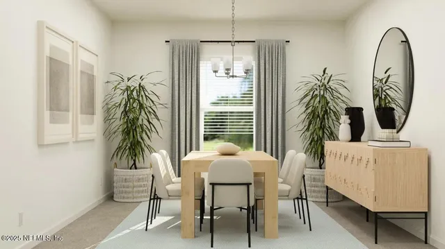 a kitchen with a table and chairs in it