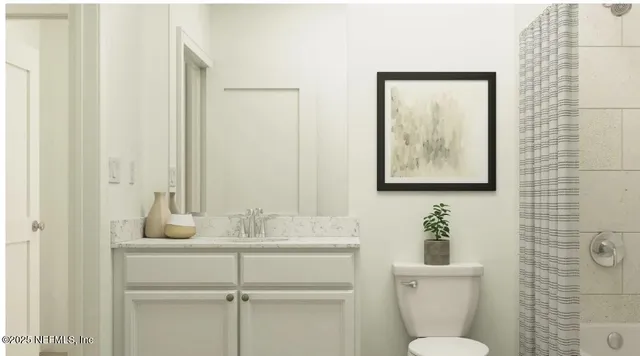 a large white bed in a white room