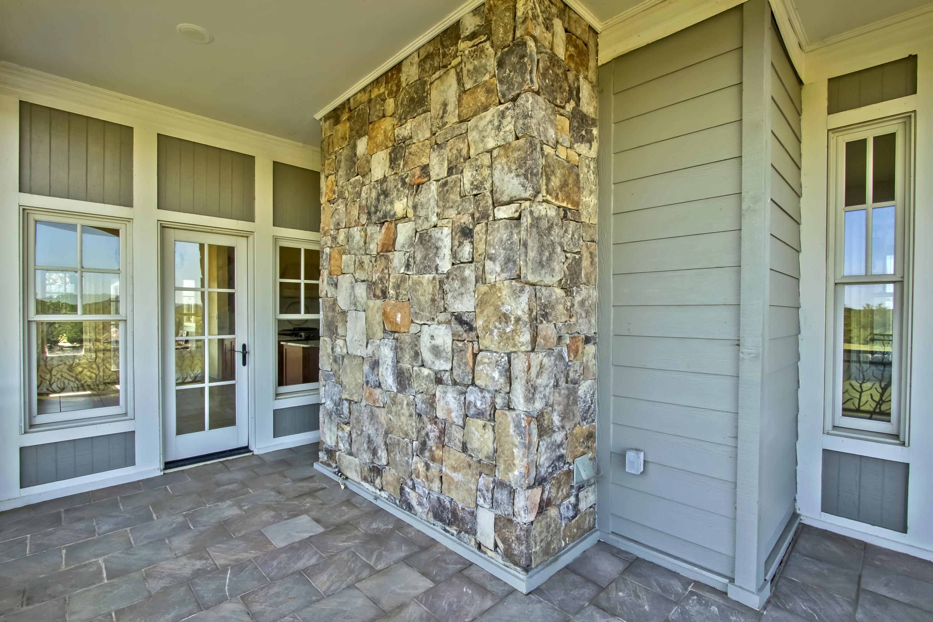 200 Thunder Road Vonore, TN 37885 - Photo 7 of 13 21_ThunderRoad_200_GrillPorch