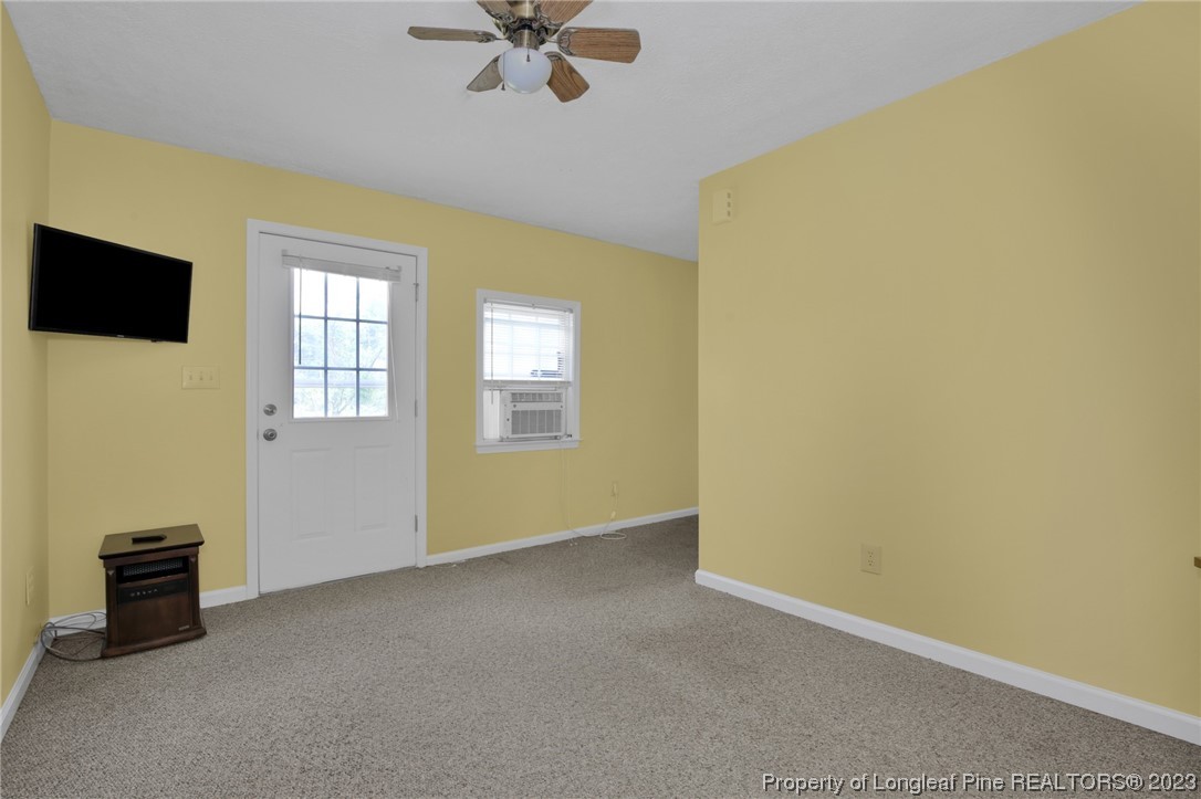 6015 Goldsboro Road Wade, NC 28395 - Photo 47 of 50 a view of a livingroom with a flat screen tv