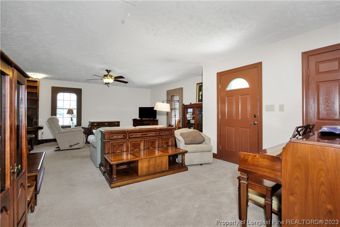 6015 Goldsboro Road Wade, NC 28395 - Photo 10 of 50 a living room with furniture