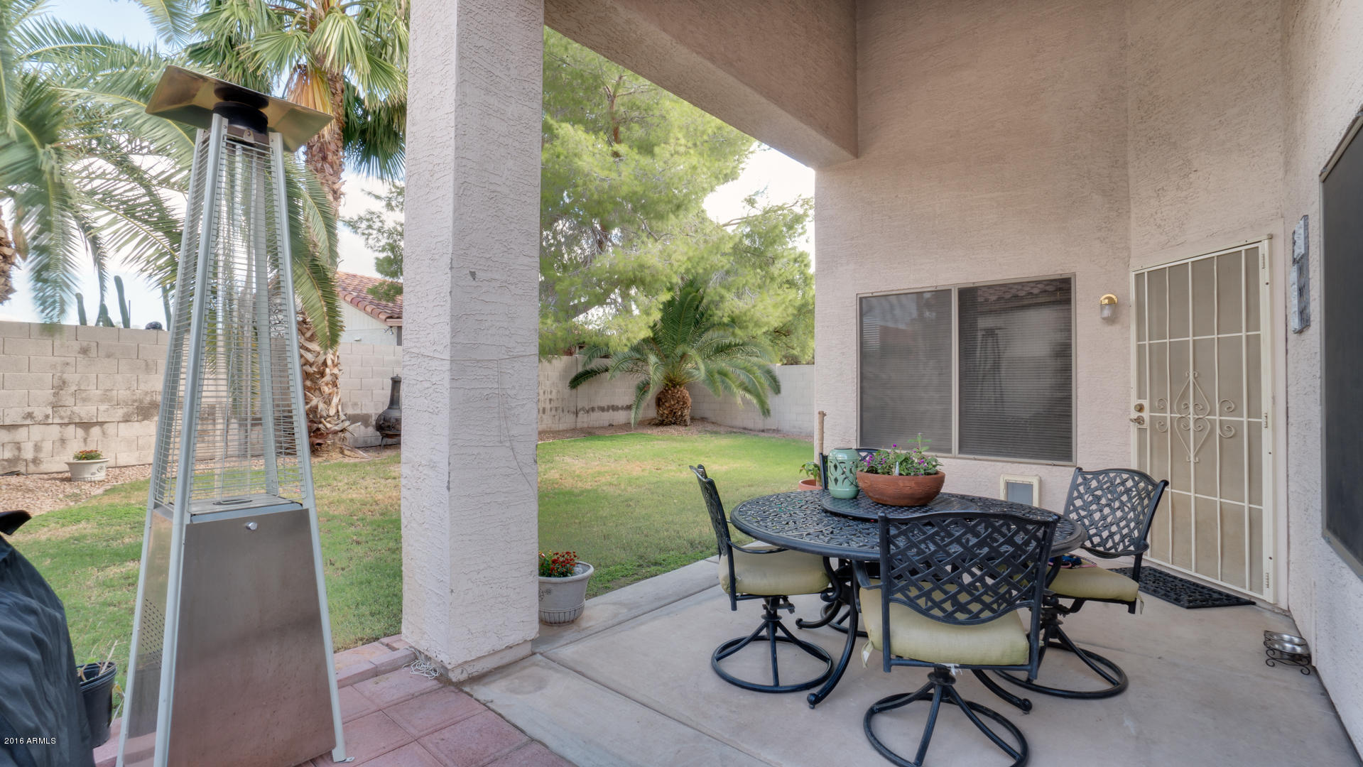 9116 West Calavar Road Peoria, AZ 85381 - Photo 6 of 30 a outdoor space with furniture