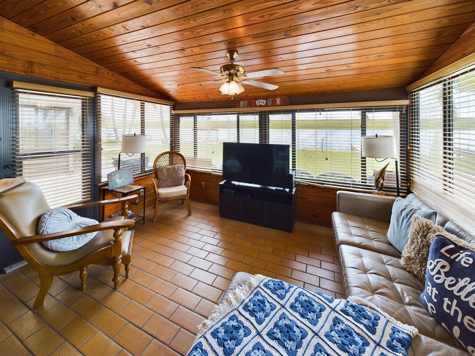 8348 Highway 441 Okeechobee, FL 34974 - Photo 13 of 25 a living room with furniture and a large window