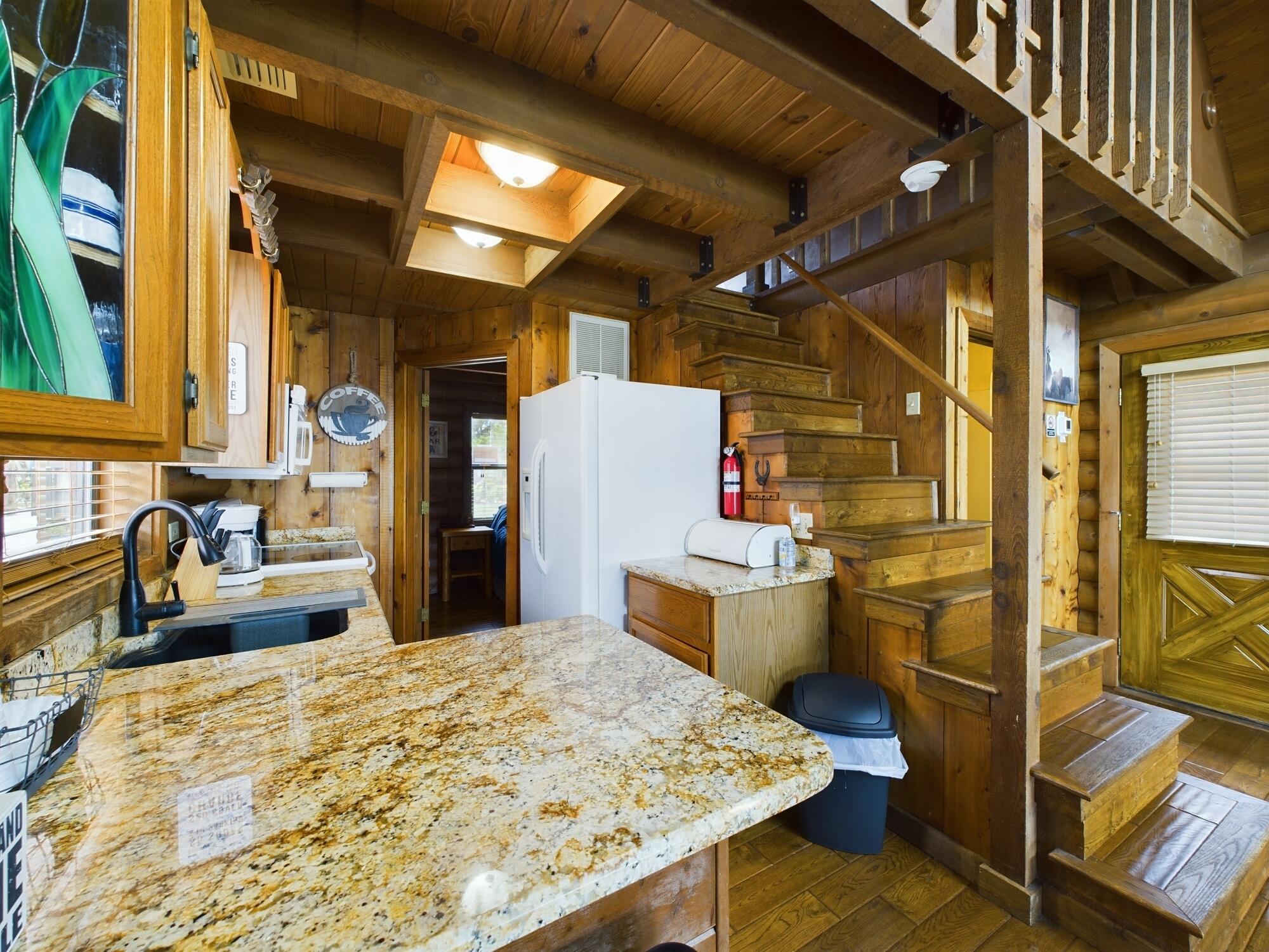 8348 Highway 441 Okeechobee, FL 34974 - Photo 20 of 25 a kitchen with a sink and refrigerator