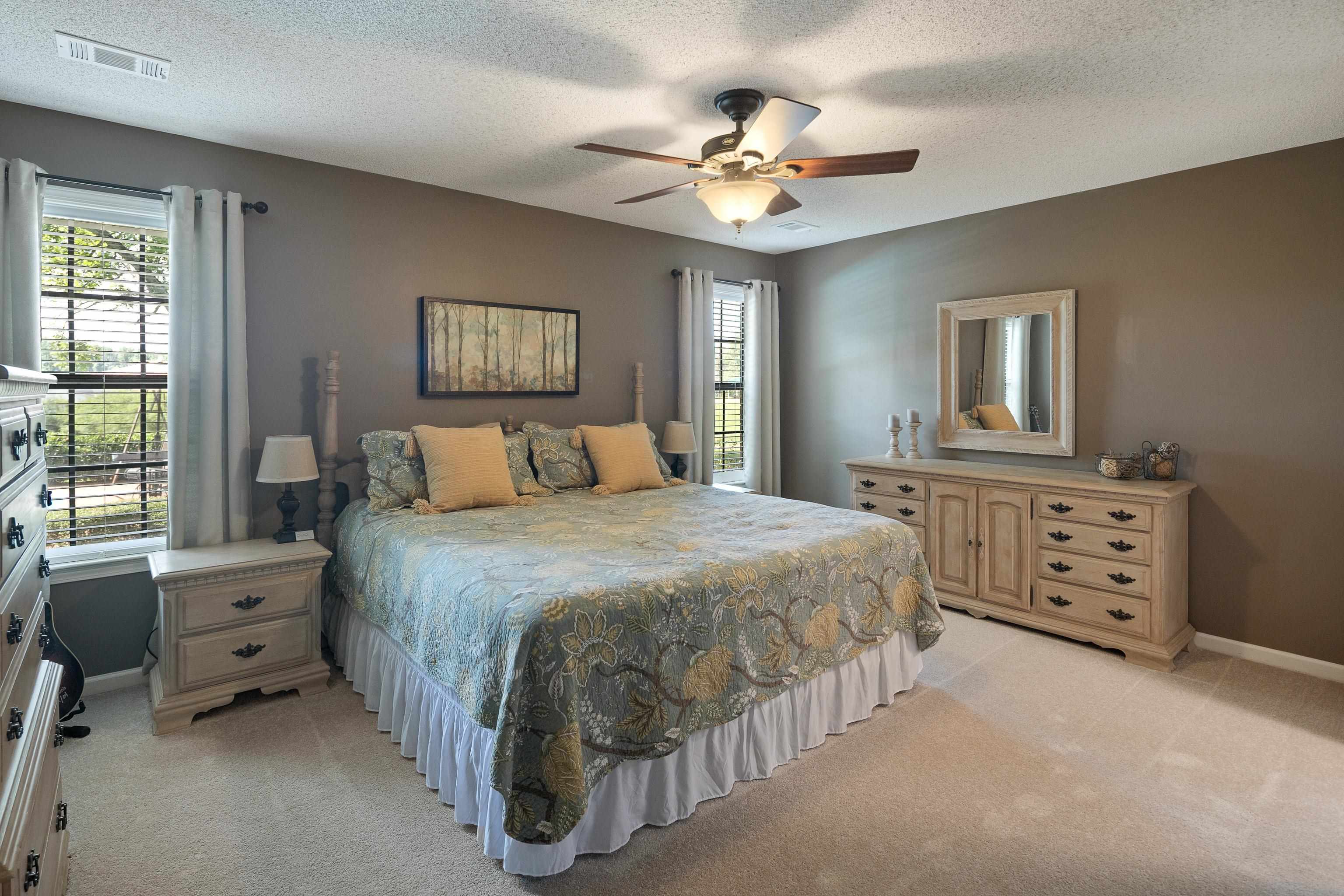 6125 Pleasant Ridge Road Millington, TN 38053 - Photo 14 of 40 a bedroom with a bed and a dresser