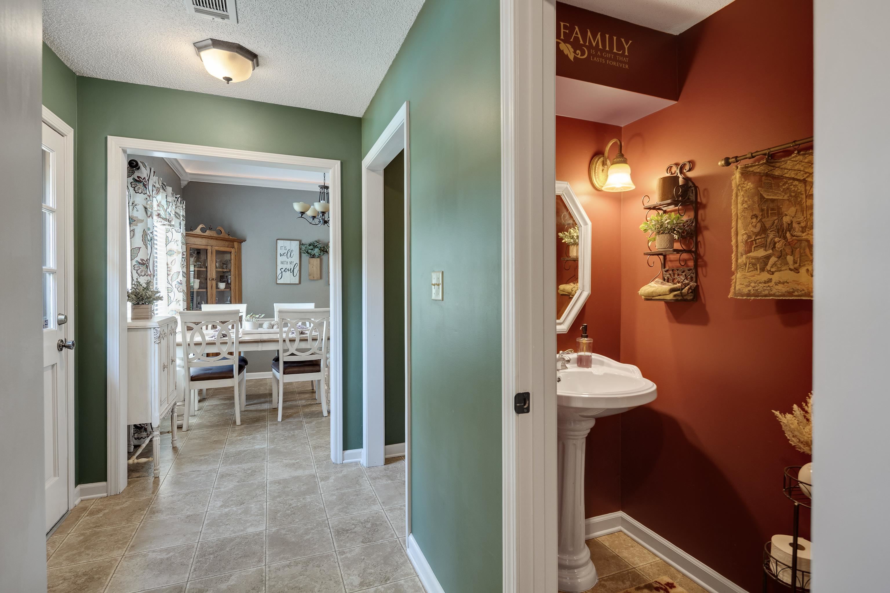 6125 Pleasant Ridge Road Millington, TN 38053 - Photo 23 of 40 a view of a room that has a dining table and chairs