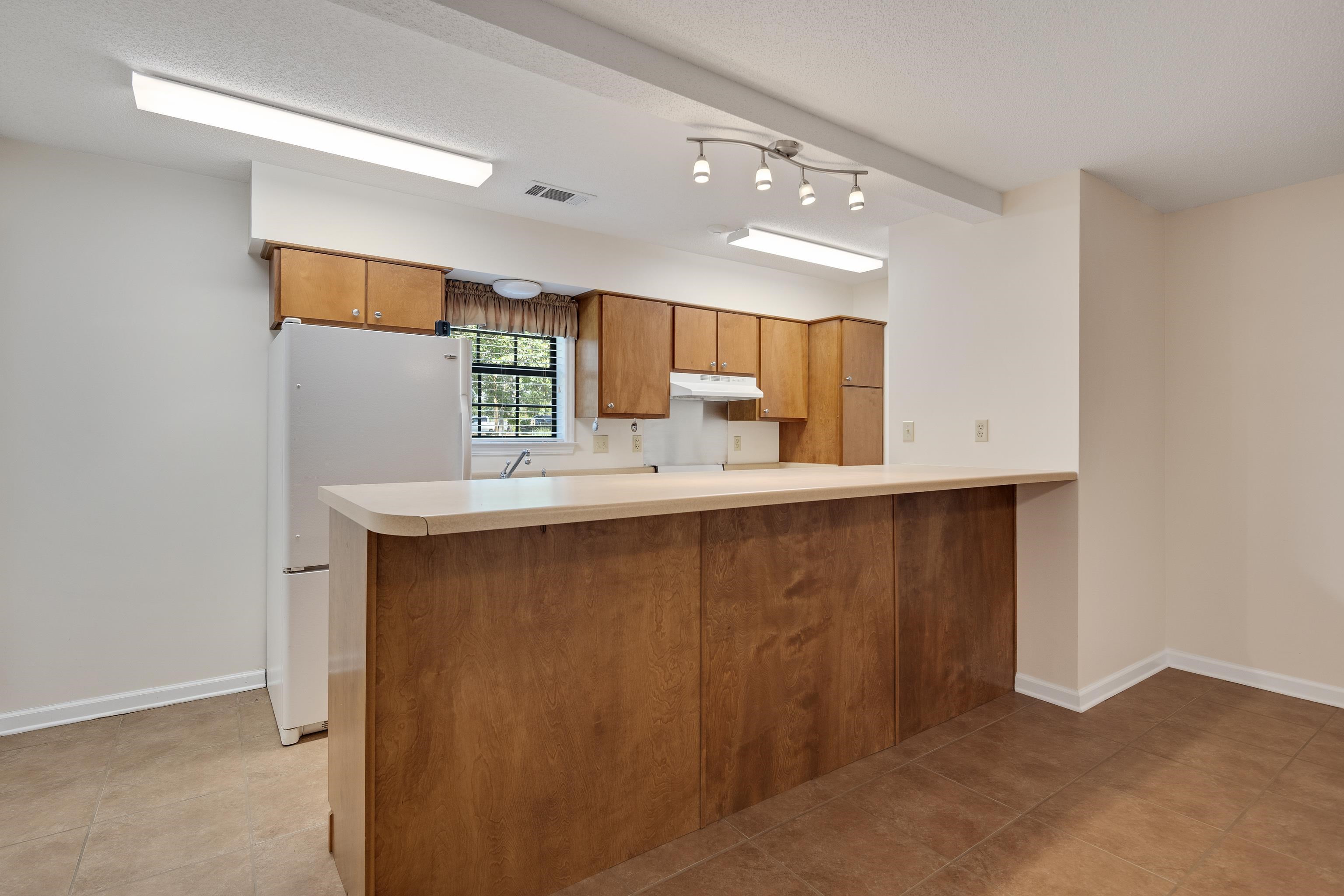 6125 Pleasant Ridge Road Millington, TN 38053 - Photo 27 of 40 a bathroom with a sink vanity and mirror