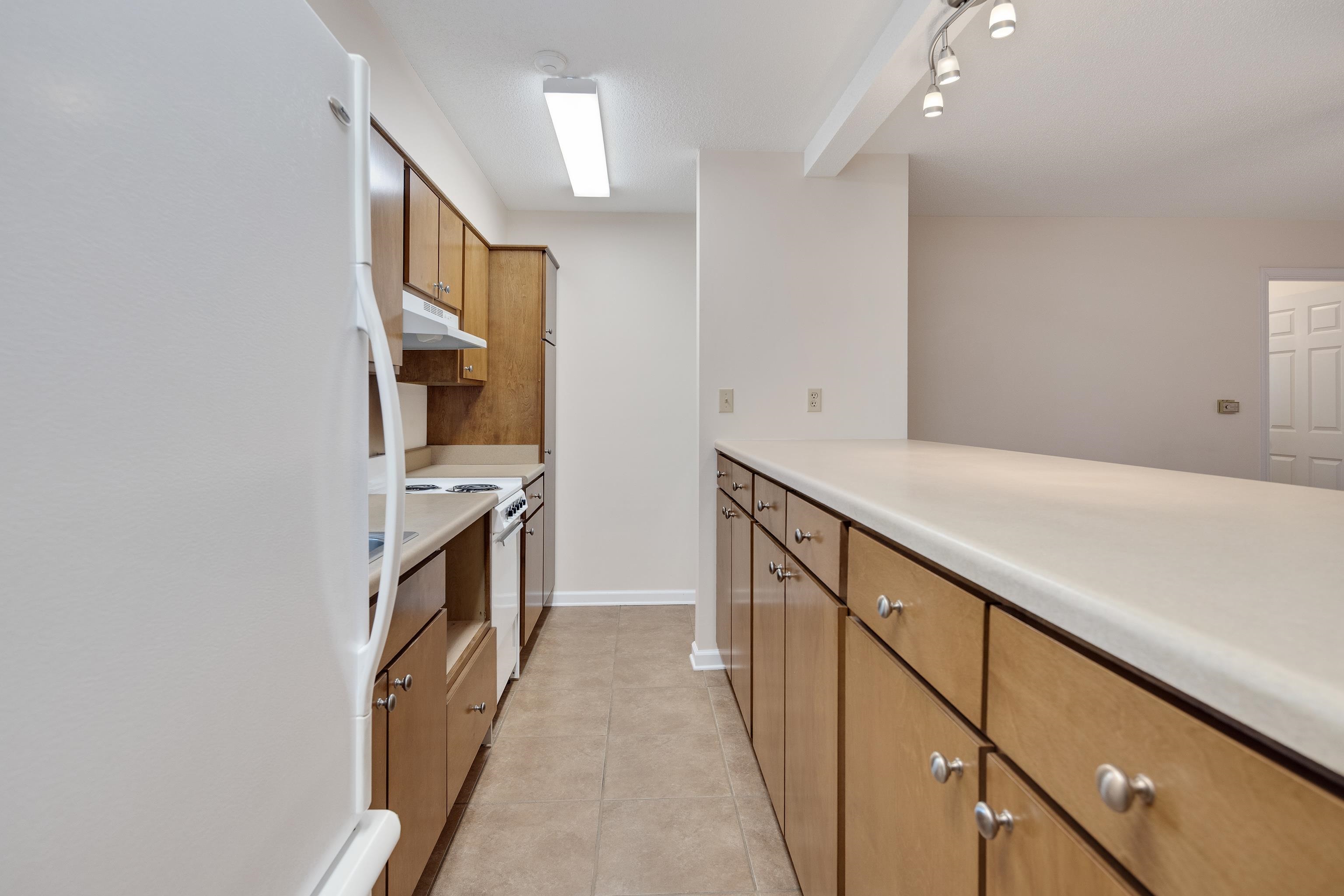 6125 Pleasant Ridge Road Millington, TN 38053 - Photo 28 of 40 a view of a kitchen cabinets and wooden floor