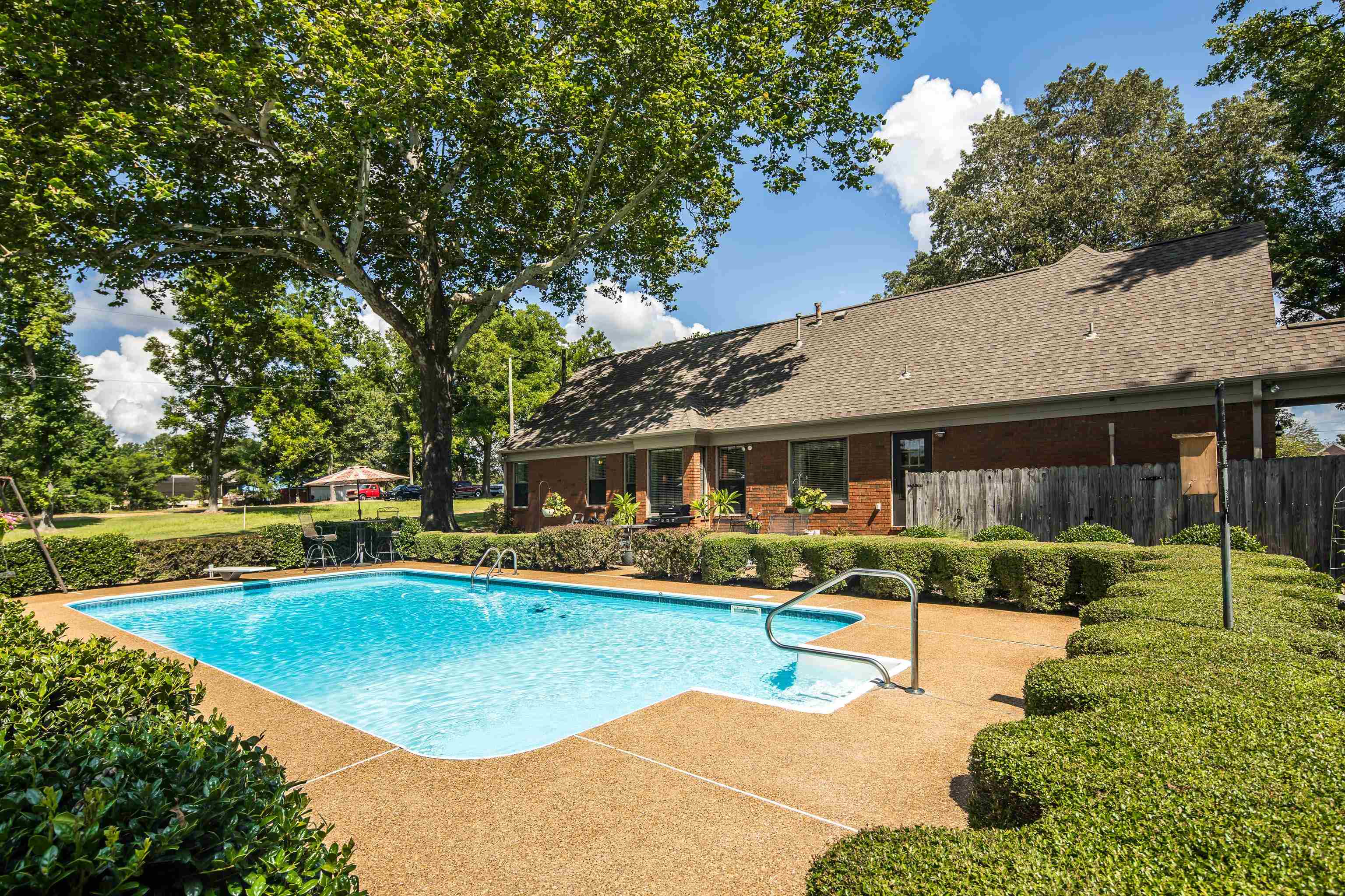 6125 Pleasant Ridge Road Millington, TN 38053 - Photo 4 of 40 a view of a house with swimming pool and sitting area