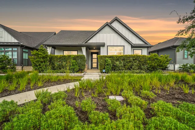 a view of a house with garden