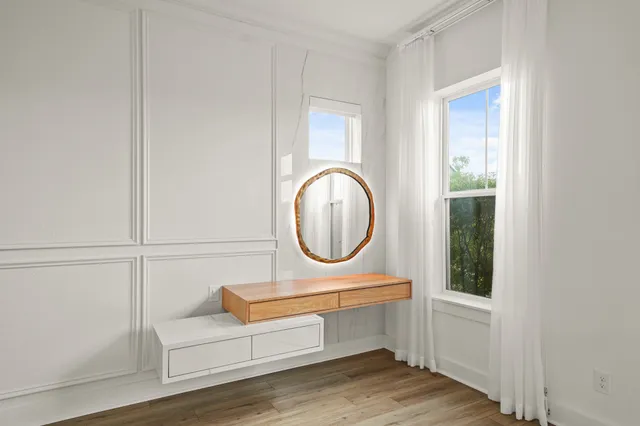 a living room with wooden floor