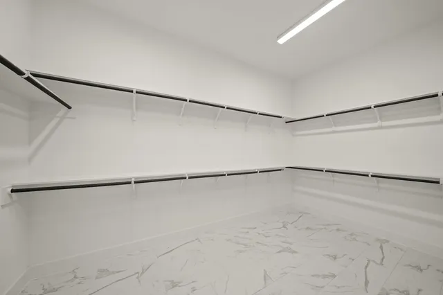 a view of small space with racks on the wall