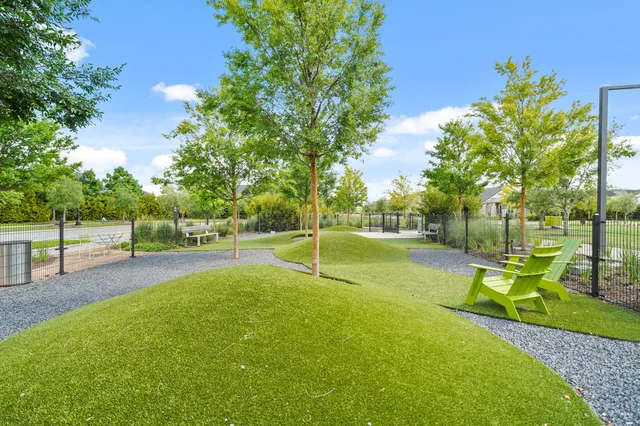 a view of a park with swings