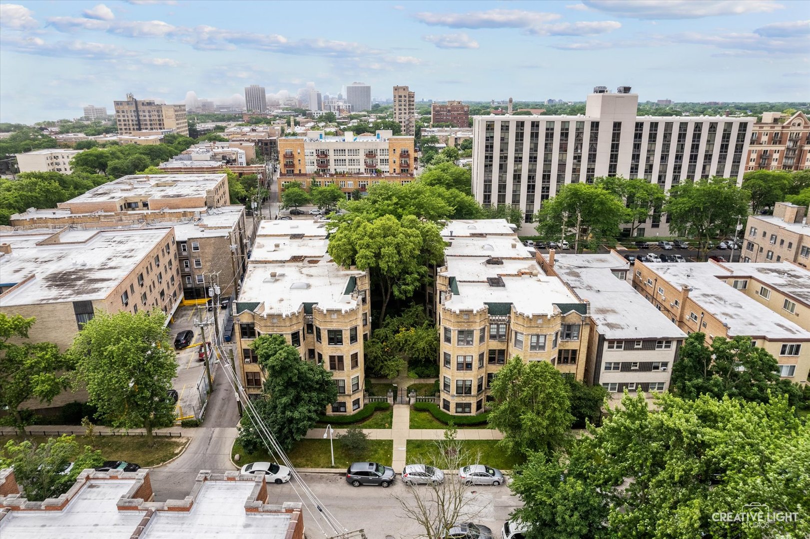 1223 West Lunt Avenue, Unit 3A Chicago, IL 60626 - Photo 1 of 18 a picture of houses with outdoor space