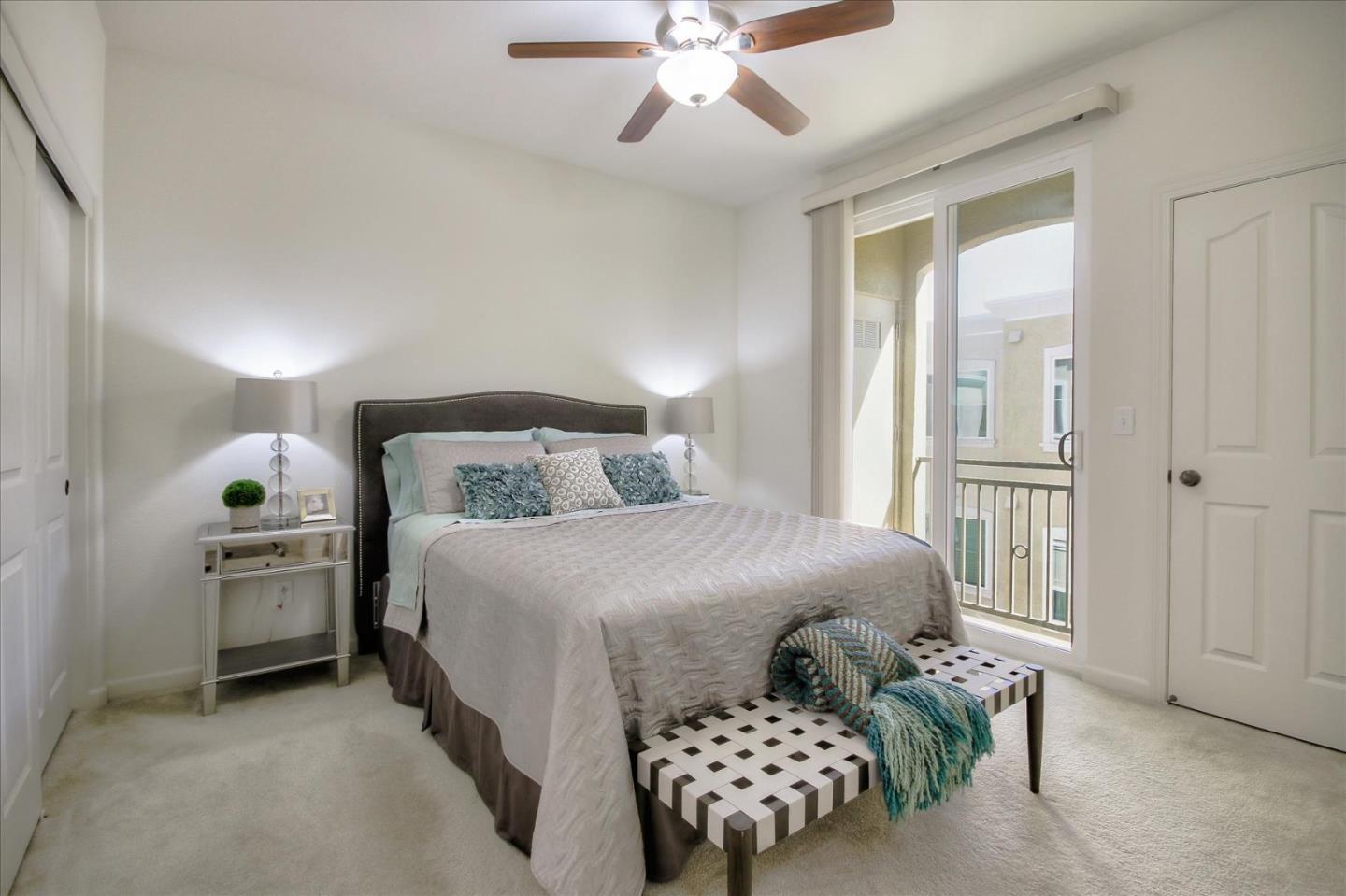4712 Norris Canyon Road, Unit 202 San Ramon, CA 94583 - Photo 16 of 30 a bedroom with bed and wooden floor