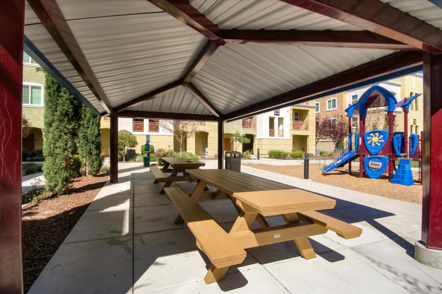 4712 Norris Canyon Road, Unit 202 San Ramon, CA 94583 - Photo 27 of 30 a building outdoor space with patio lots of furniture