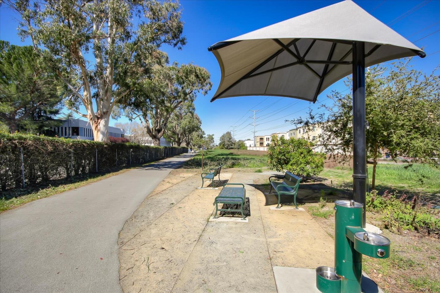 4712 Norris Canyon Road, Unit 202 San Ramon, CA 94583 - Photo 29 of 30 a view of a swimming pool with a patio