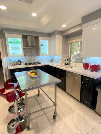 a spacious bathroom with a double vanity sink and a mirror