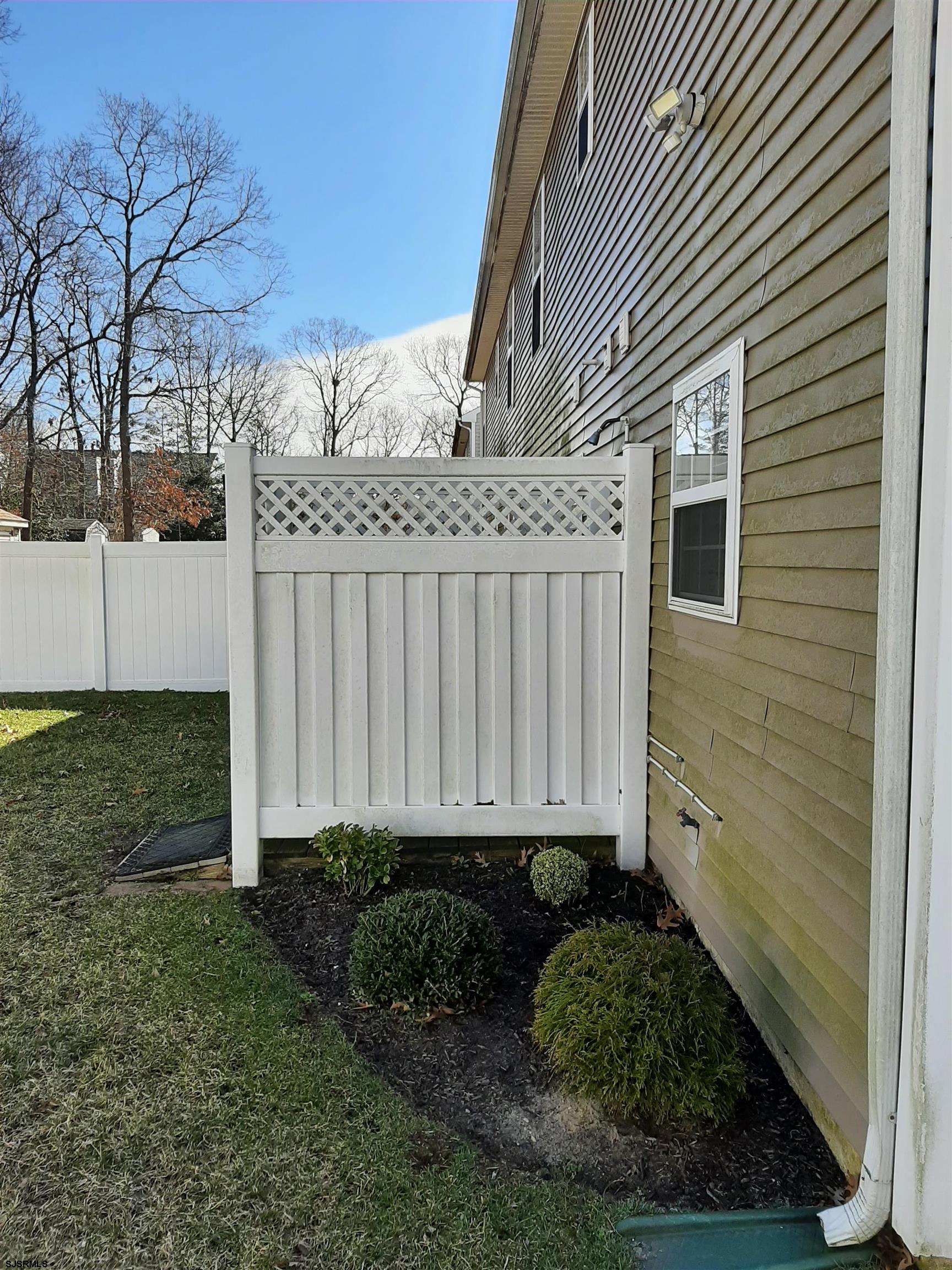 9 Pacific Avenue, Unit 9 Somers Point, NJ 08244 - Photo 18 of 19 a view of a back yard of the house