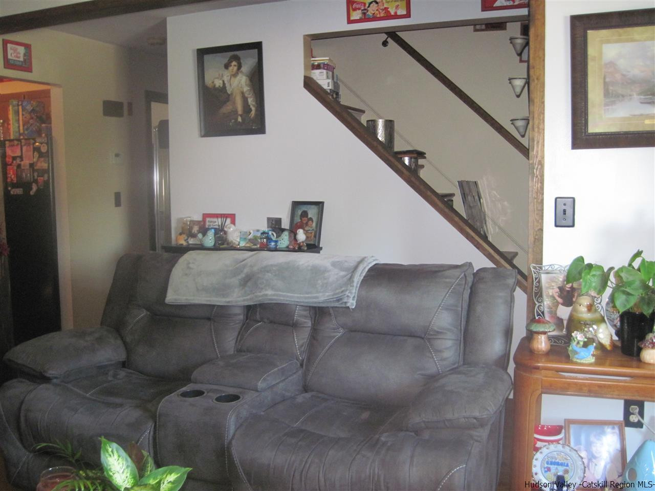 3 Hewlett Road Red Hook, NY 12571 - Photo 9 of 22 a living room with furniture and flowers