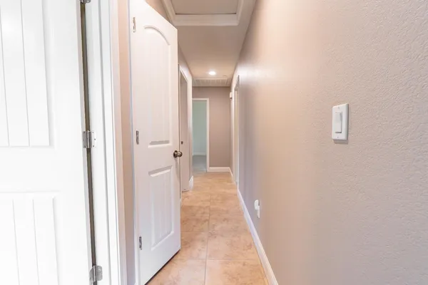 a view of a house with swimming pool and sitting area