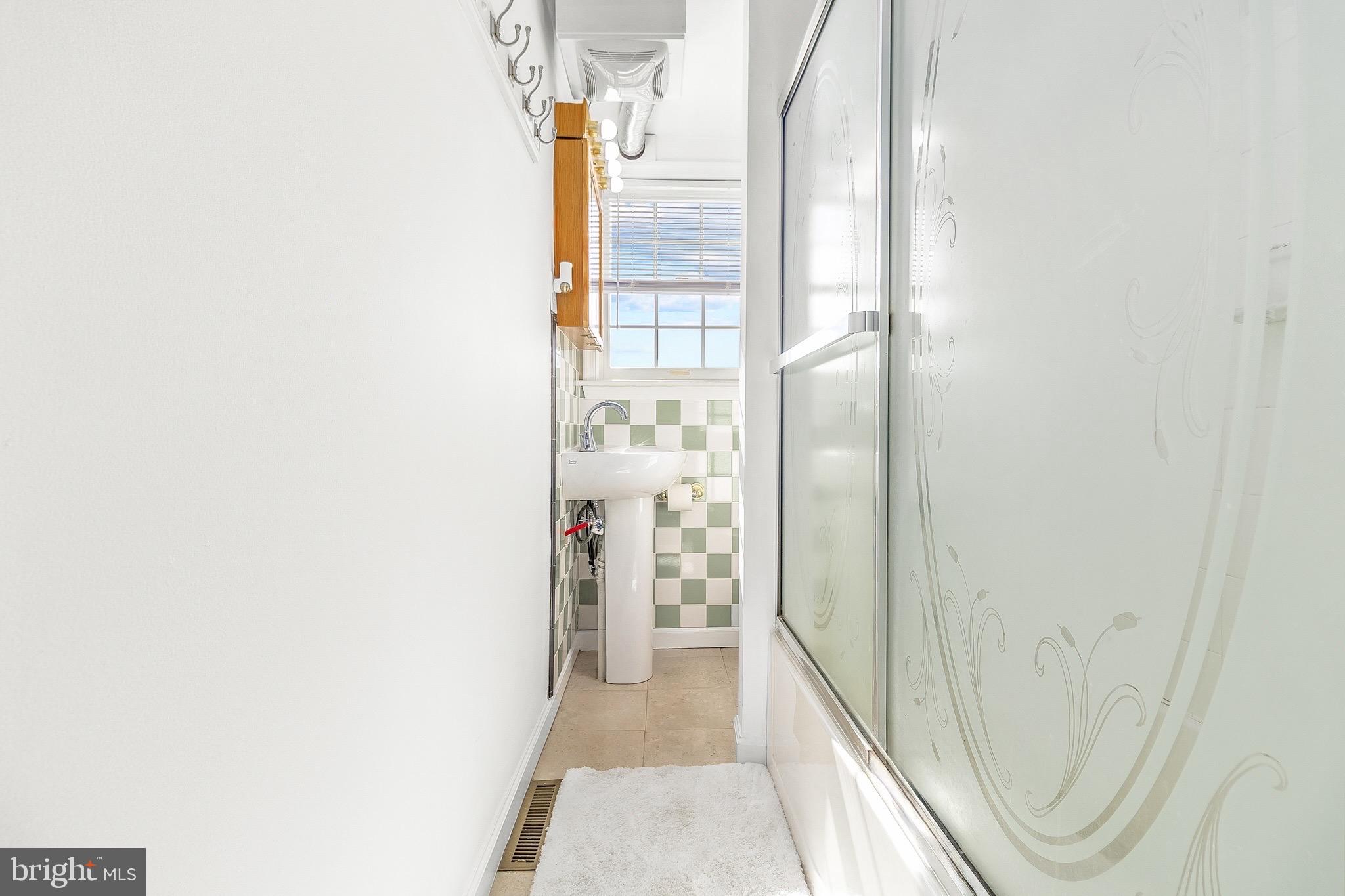 117 South Pavilion Avenue Riverside, NJ 08075 - Photo 19 of 38 a view of a hallway with wooden floor and entryway