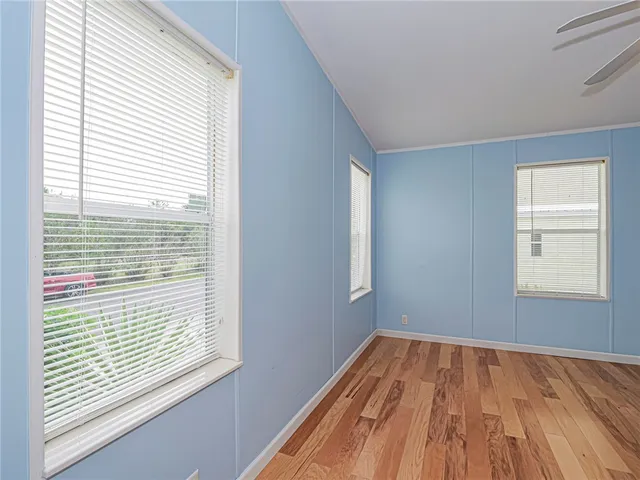 a view of a room that has a window in it