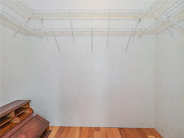 a view of a room with racks on the wall