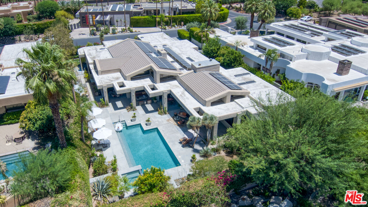 6 Rocky Lane Rancho Mirage, CA 92270 - Photo 2 of 57 an aerial view of multiple houses with yard