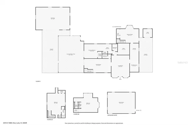 an aerial view of residential houses with outdoor space and swimming pool