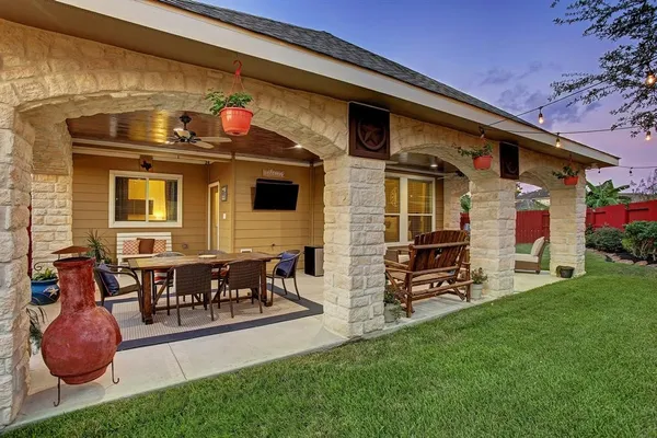 a view of an outdoor dining space with furniture