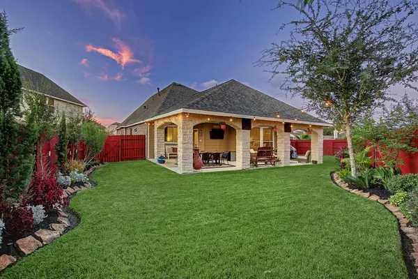 a front view of a house with patio