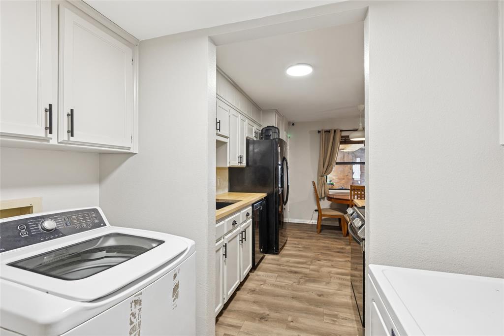 248 Mountain View Drive Azle, TX 76020 - Photo 11 of 26 a kitchen with a stove and a refrigerator