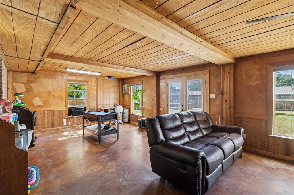 248 Mountain View Drive Azle, TX 76020 - Photo 20 of 26 a living room with furniture and a large window