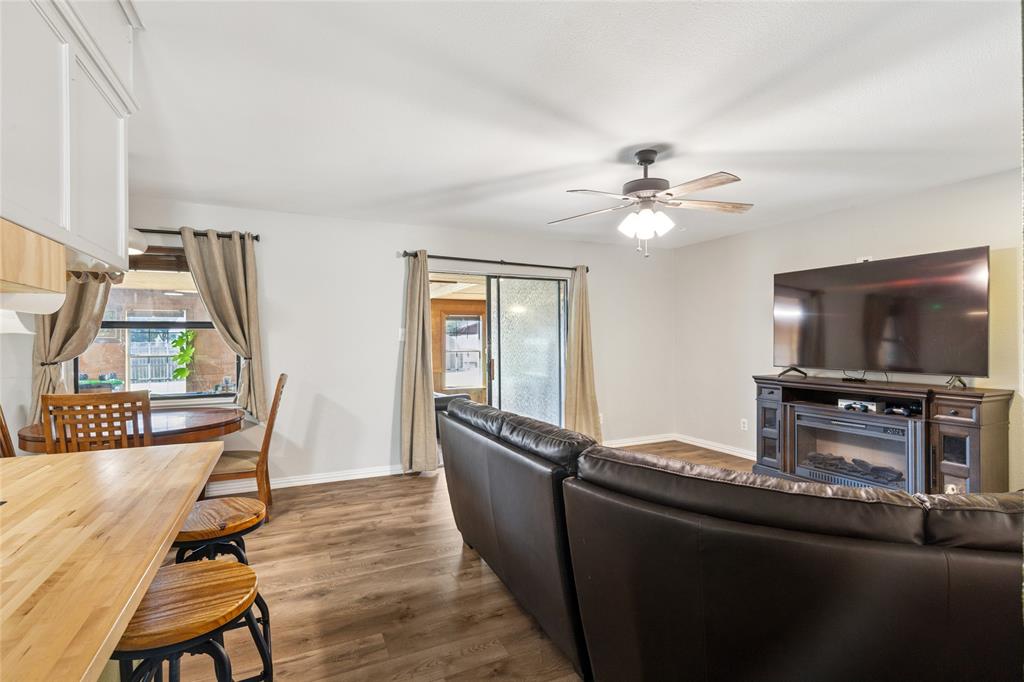 248 Mountain View Drive Azle, TX 76020 - Photo 5 of 26 a living room with furniture and a flat screen tv