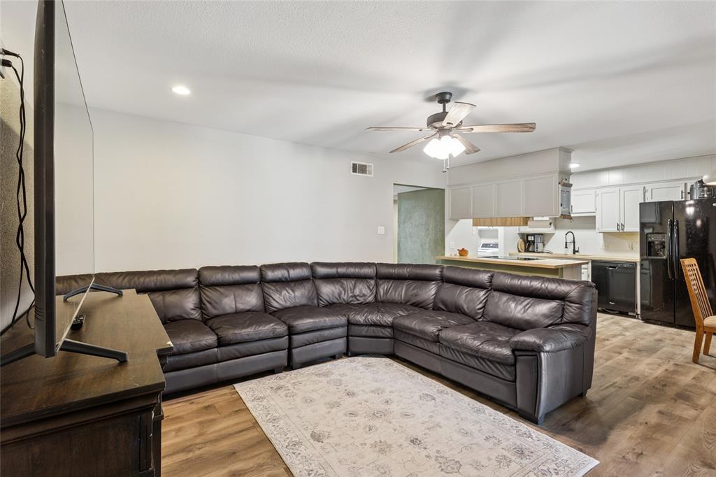 248 Mountain View Drive Azle, TX 76020 - Photo 7 of 26 a living room with furniture and kitchen view