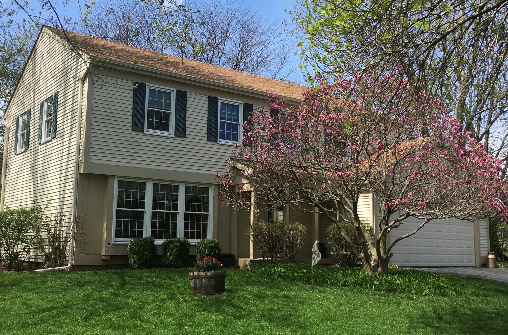 2105 Countryside Circle Naperville, IL 60565 - Photo 2 of 26 a view of a house with a yard and a large tree