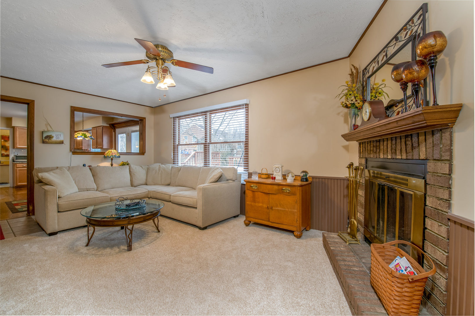 2105 Countryside Circle Naperville, IL 60565 - Photo 13 of 26 a living room with furniture and a fireplace