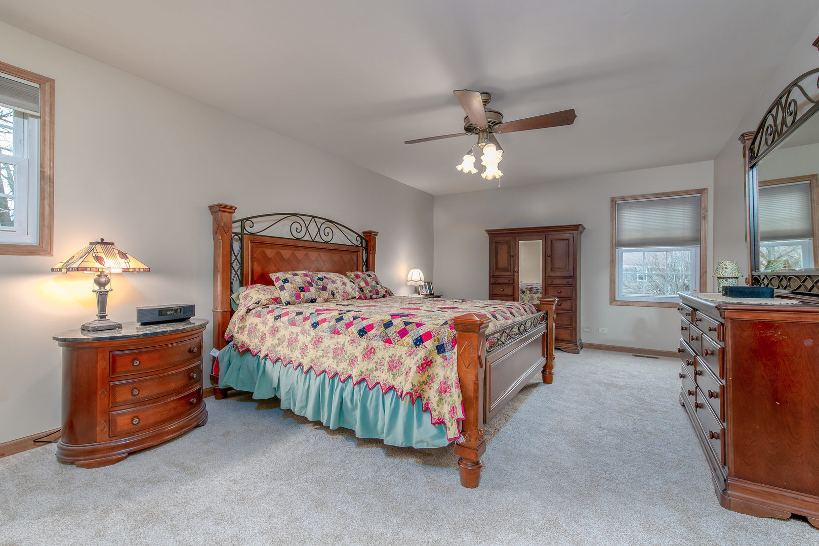 2105 Countryside Circle Naperville, IL 60565 - Photo 16 of 26 a bedroom with a bed dresser and a window
